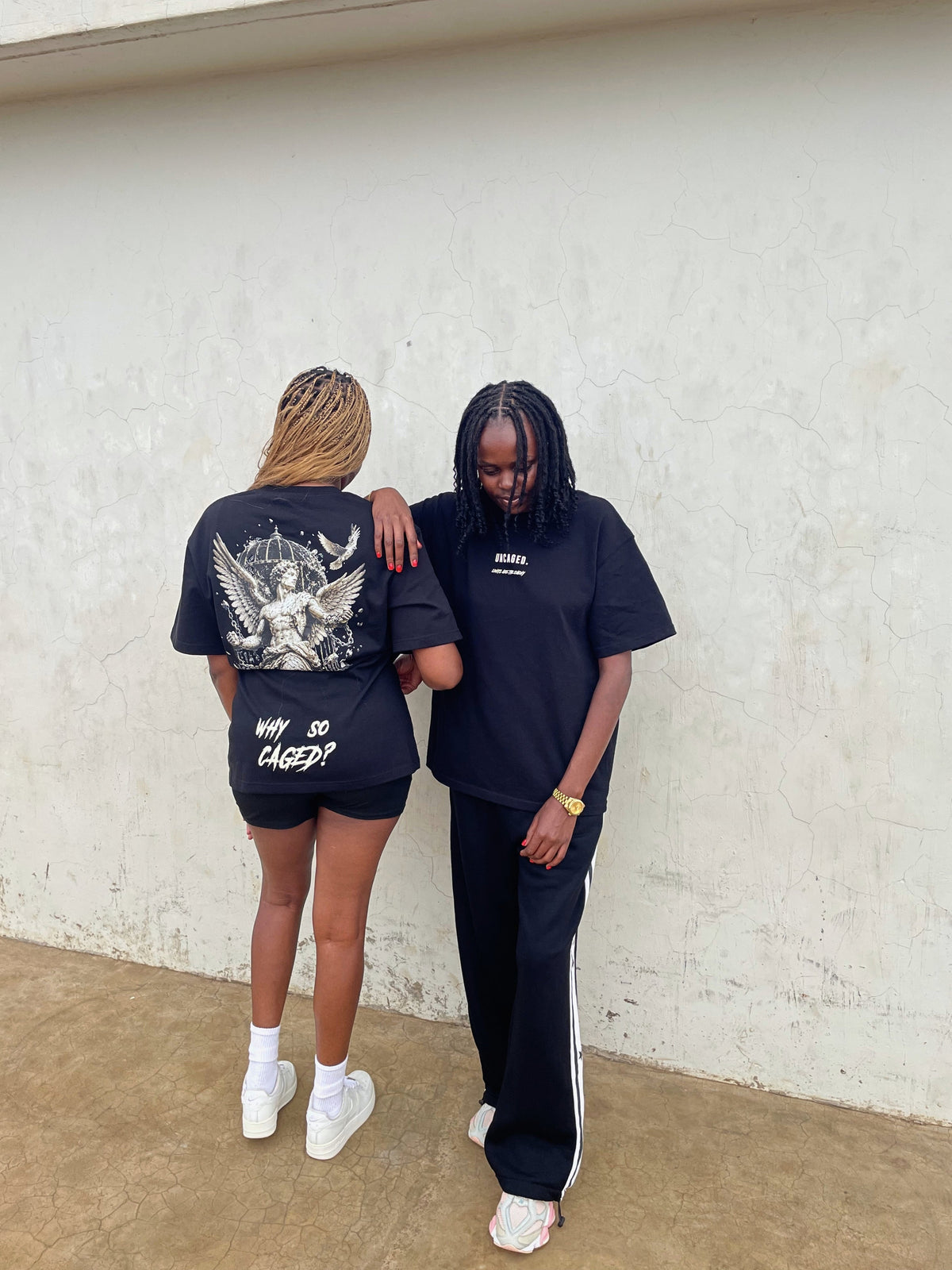 "WHY SO CAGED?" BLACK TEE
